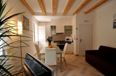 dining and living area with fully equipped kitchen