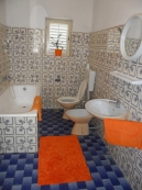 bathroom with washing machine